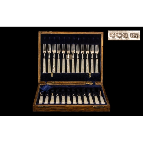 246 - A Superb Quality Boxed Set of 24 Silver and Pearl Handles Fish Knifes and Forks. Hallmark Sheffield ... 