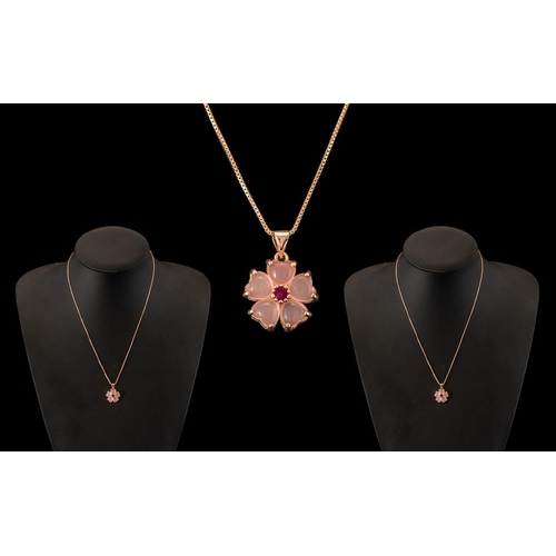 289A - Sterling Silver Pendant And Necklace In A Rose Gold Finish, Flower Design - Ruby Style Stone To Cent... 