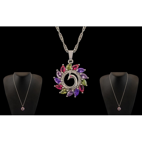 302A - A Sterling Silver Pendant And Chain In Stylised Peacock Design. Austrian Crystals Surrounded By Rubi... 