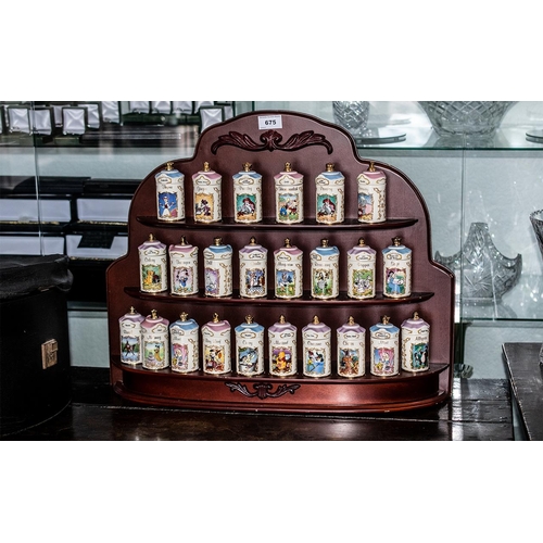675 - Walt Disney Spice Jar Collection, Lenox brand, depicting Disney characters, with pastel lids with cr... 