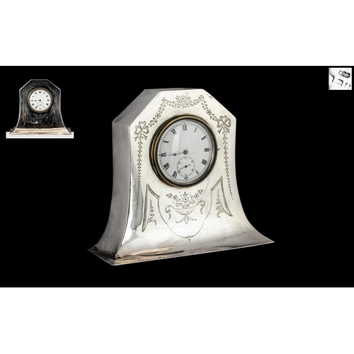 105 - Edwardian Silver Miniature Dressing Table Clock with a white enamel dial and Swiss movement; maker J... 