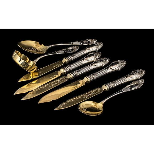 186 - Five French Silver Fruit Knives with embossed hilts and gilded blades, plus a sugar dusting spoon an... 