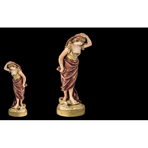 437 - Two Nao Figures, a girl holding a dog and a nun, praying, each 11 inches (27.5cms) high (2)