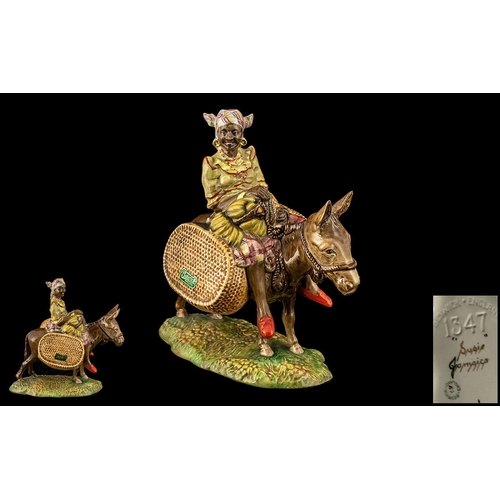 480 - Beswick 'Susie Jamaica' Figure of a lady on a donkey, Beswick No. 1347.  This has the rare gold back... 