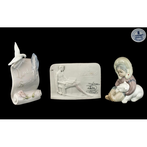 513 - Two Lladro Plaques, one signed Lladro Collectors Society white plaque, and one glazed Lladro Society... 