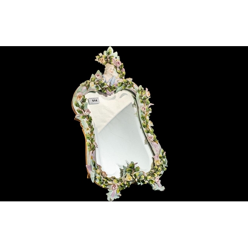 514 - Porcelain Dressing Table Mirror, highly decorated with flowers and foliage with a lady's head to the... 