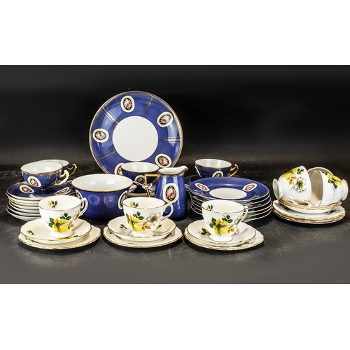 596 - Part Czechoslovakian Tea Service style 'Epiac' comprising four tea cups, ten saucers, nine sandwich/... 