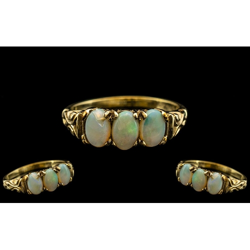 55 - Ladies - Attractive 9ct Yellow Gold - 3 Stone Opal Set Ring, Ornate Setting, 3 Oval Shaped Opals of ... 