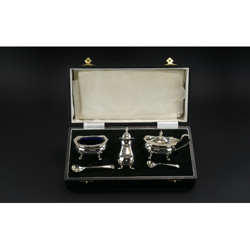 138 - Elizabeth ll Five Piece Sterling Silver Condiment Set, boxed, complete with blue glass liners, hallm... 
