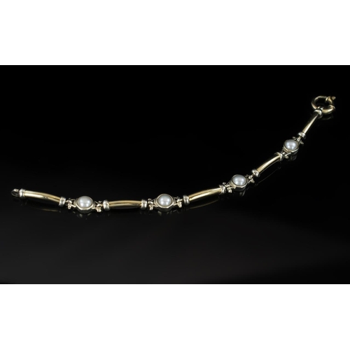 124 - Ladies - Attractive Two-Tone 9ct Gold Contemporary Designed Pearl Set Bracelet with Excellent Clasp.... 