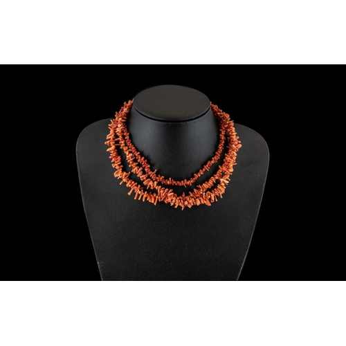 148A - 1920s/30s Mediterranean Pink Coral Necklaces, three necklaces in pink coral of natural form, largest... 