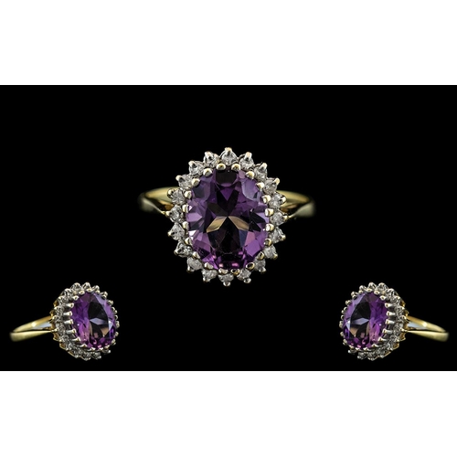 164 - 18ct Gold - Amethyst and Diamond Set Cluster Ring - Flower head Setting. Marked 750 - 18ct to Interi... 