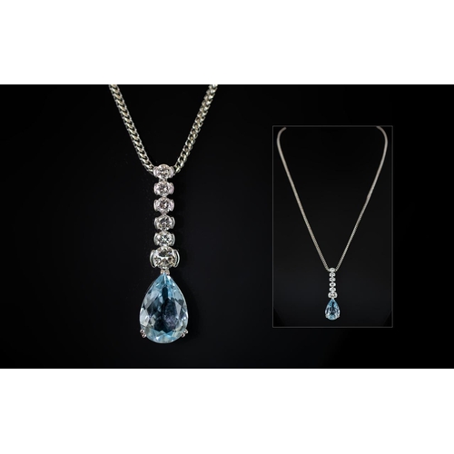 54 - Ladies - Stunning 18ct White Gold Diamond and Blue Topaz Set Pendant Drop. Attached to a 18ct White ... 