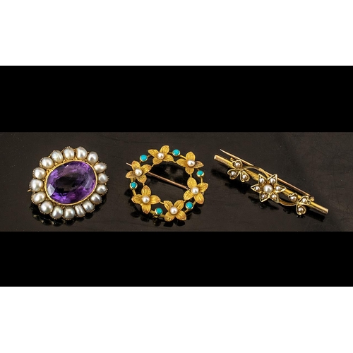 42A - Victorian Period 1837 - 1901 A Fine Trio of 9ct Gold Stone Set Brooches. Comprises 1/ A Small Amethy... 