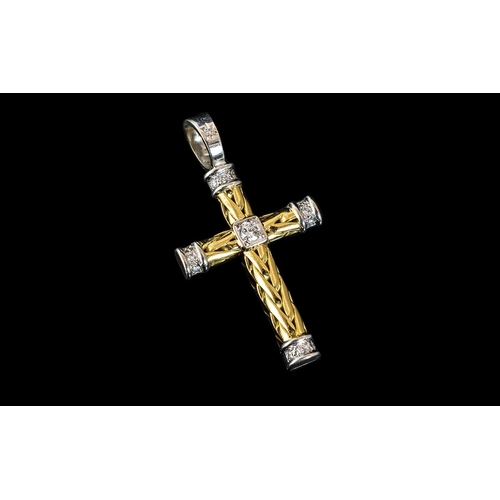 105A - 18ct Gold Diamond Set Cross, with white gold diamond set terminals, set with 14 round brilliant cut ... 