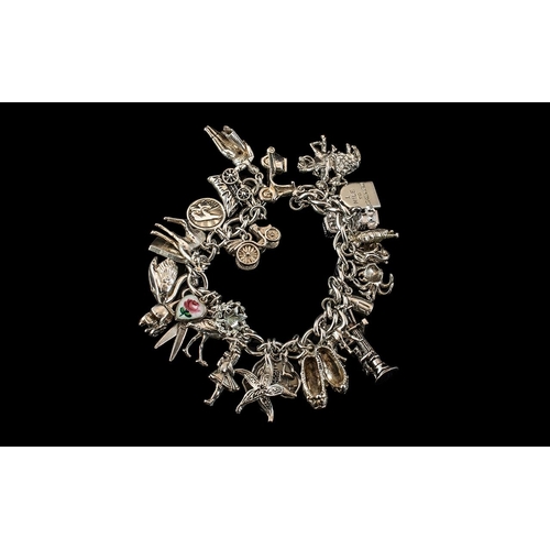 135 - Vintage Sterling Silver Charm Bracelet - Loaded with 28 Silver Charms of Good Quality. All Marked fo... 