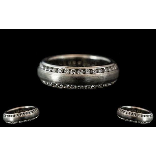 140A - A Platinum Diamond Set Wedding/Eternity Ring,  channel set edges with two continuous rows of round m... 