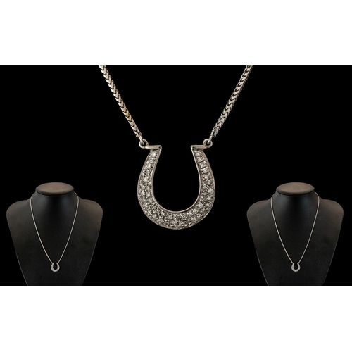 156 - 18ct White Gold - Attractive Diamond Set Horseshoe Pendant, Attached to a 18ct White Gold Chain. Ful... 