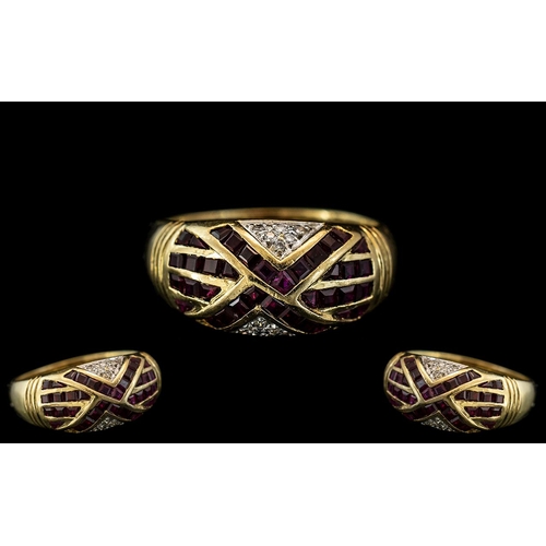 18 - Ladies 18ct Gold - Princes Cut Rubies and Diamond Set Dress Ring. The Princes Cut Rubies of Good Col... 