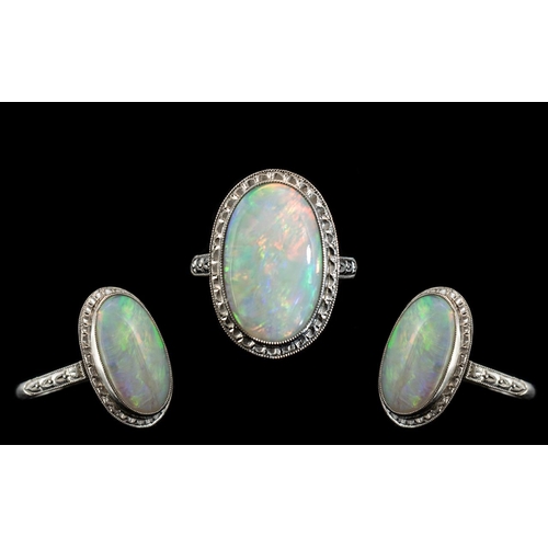 283 - Antique Platinum Superb Opal Set Dress Ring, marked Platinum to interior of shank. The large oval sh... 