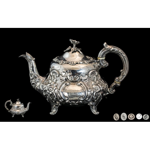 115B - Early Victorian Period Superb Embossed Sterling Silver Teapot.  Wonderful decoration and proportions... 