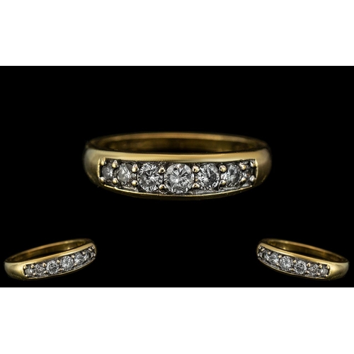 22 - 18ct Yellow Gold - Superior Quality and Attractive Seven Stone Diamond Set Dress Ring. Marked 750 to... 