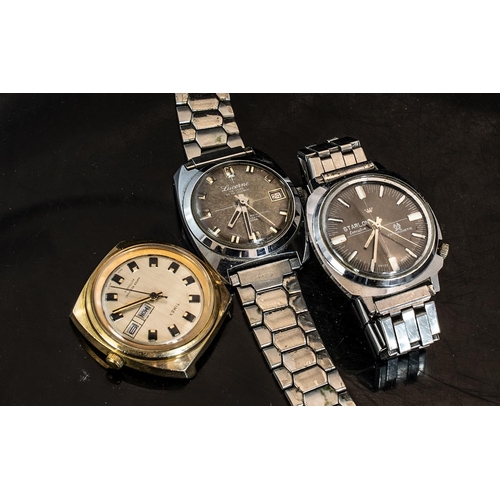 375 - Three Gents Wrist Watches, to include a Starlon Executive manual wind, a Timex Day/Date Automatic, a... 