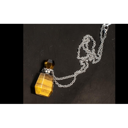250A - Tiger Eye Perfume Bottle Pendant Necklace, the bottle cut from a single piece of tiger eye or tiger'... 