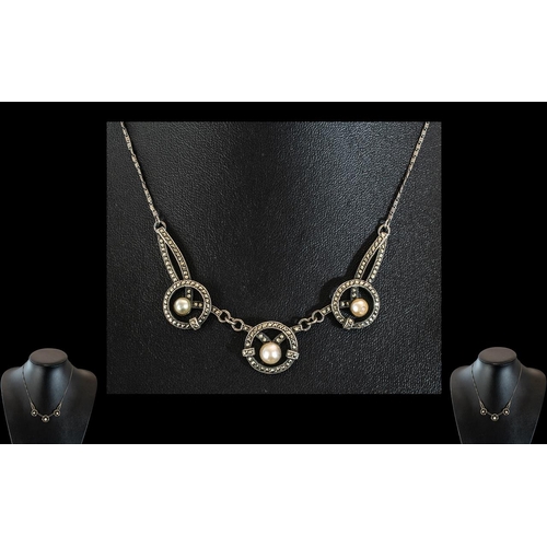 260 - 1920's Marcasite Necklace, lovely design of three ring shaped marcasite circles with central pearls,... 