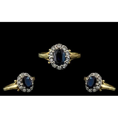 280 - 18ct Gold Attractive Sapphire and Diamond Set Cluster Ring, hallmarked to interior of shank, the cen... 