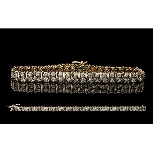 284 - 9ct Yellow Gold Diamond Set Line Bracelet with full hallmark for 9.375, est. diamond weight 0.8ct, l... 