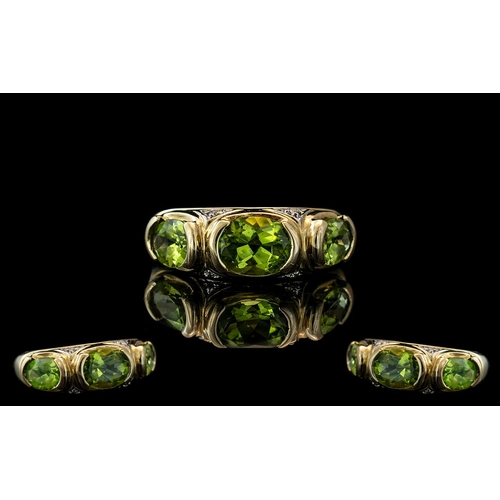 69 - Ladies - Attractive 9ct Gold Peridot and Diamond Set Ring. Full Hallmark to Interior of Shank. The P... 