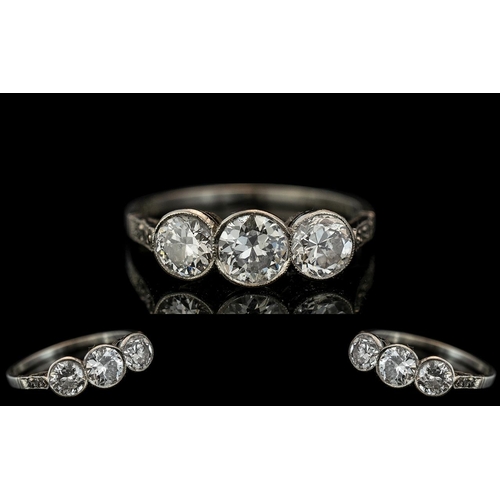 13 - 18ct White Gold - Good Quality Ladies 3 Stone Diamond Ring. The Pave Set Round Diamonds of Top Colou... 