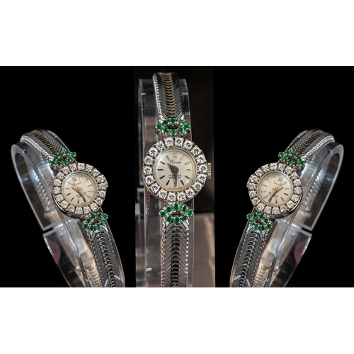 13A - 18ct White Gold - Ladies Mechanical Wind Brevet - Diamond and Emerald Set Cocktail Watch. c.1930's. ... 