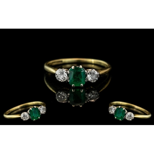 19 - Ladies 18ct Gold and Platinum 3 Stone Diamond and Emerald Set Ring. Marked 18ct and Platinum to Inte... 