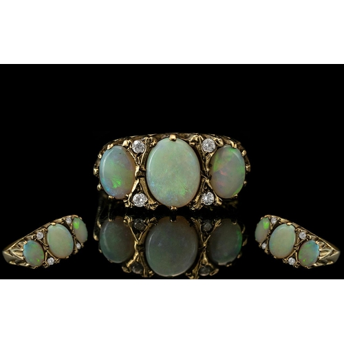 23 - Ladies - Attractive 9ct Gold 3 Stone Opal and Diamond Set Ring. The 3 Large Opals with Diamond Space... 