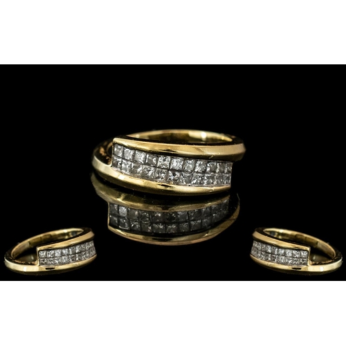 24A - 18ct Gold - Attractive Baguette Cut Diamond Set Ring. Marked 750 - 18ct to Interior of Shank. The Tw... 