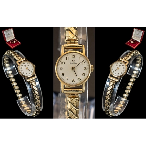 38A - Omega - Ladies 9ct Gold Cased Mechanical Wrist Watch with Attached Gold Plated Expanding Bracelet. c... 