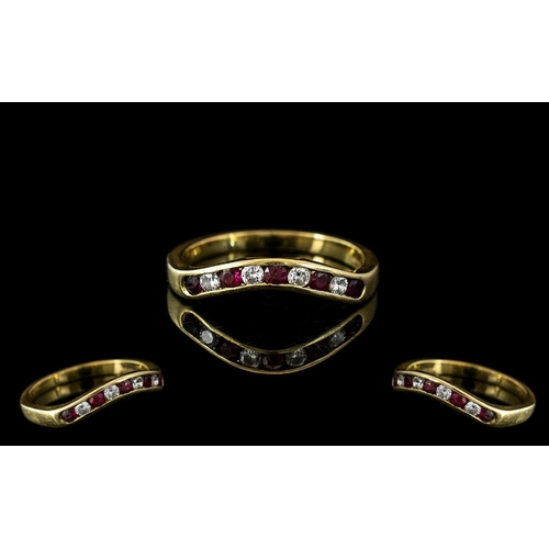 53 - Ladies 18ct Gold Ruby and Diamond Set Dress Ring. Hallmark for 18ct - 750 to Interior of Shank. Rubi... 