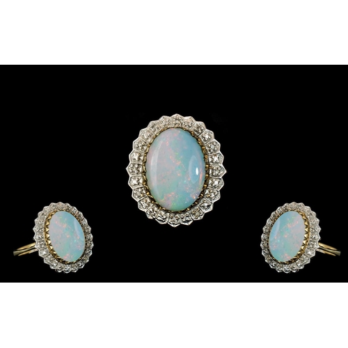 71 - Ladies 9ct Gold - Large Opal and Diamond Set Ring. Fully Hallmarked for 9.375, The Large Oval Shaped... 