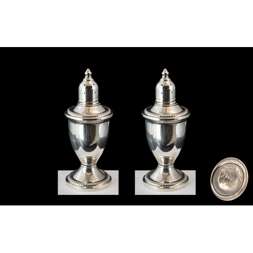 102 - A Fine Pair of Sterling Silver Pepperettes of Pleasing Form. Both Marked Sterling, Each with a Weigh... 