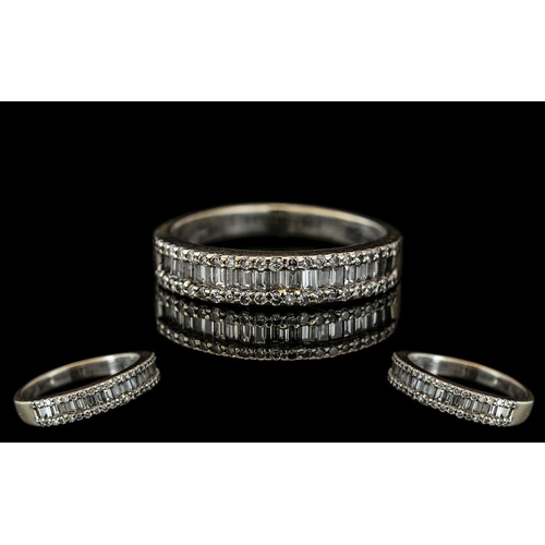 11A - 18ct White Gold - Attractive Brilliant and Baguette Cut Diamond Half Eternity Ring. Full Hallmark fo... 