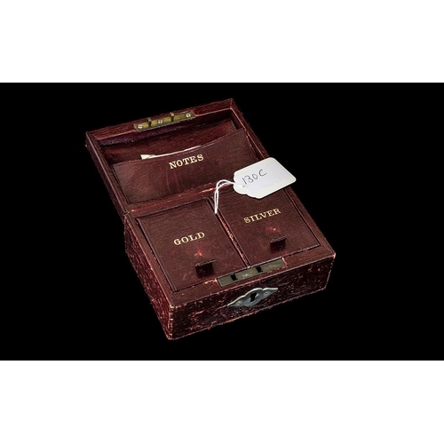 1430 - LATE VICTORIAN RED LEATHER MONEY BOX the interior complete with two gilt tooled divisions marked 'Go... 