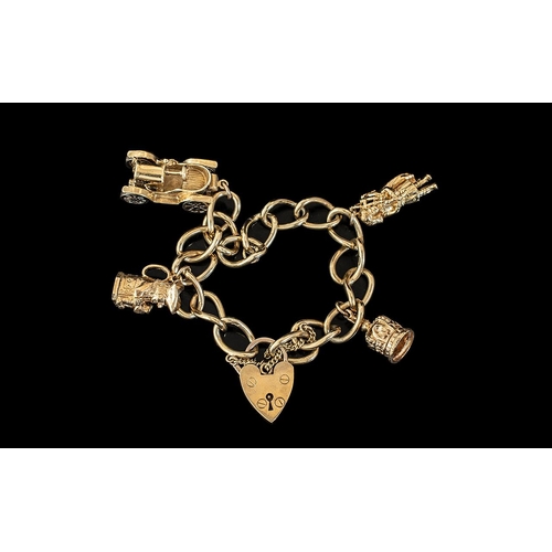 151A - Ladies 9ct Gold Charm Bracelet With 4 Gold Charms - And Heart Shaped Gold Clasp and Safety Chain. Ch... 