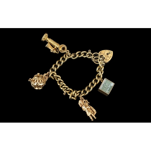 241 - Ladies 9ct Gold Charm Bracelet With 4 Gold Charms - And Heart Shaped Gold Clasp and Safety Chain. Ch... 