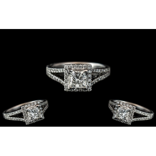 255A - Platinum - Superb Split-Set Diamond Set Dress Ring. The Central Princes Cut Diamond Surrounded by Wh... 