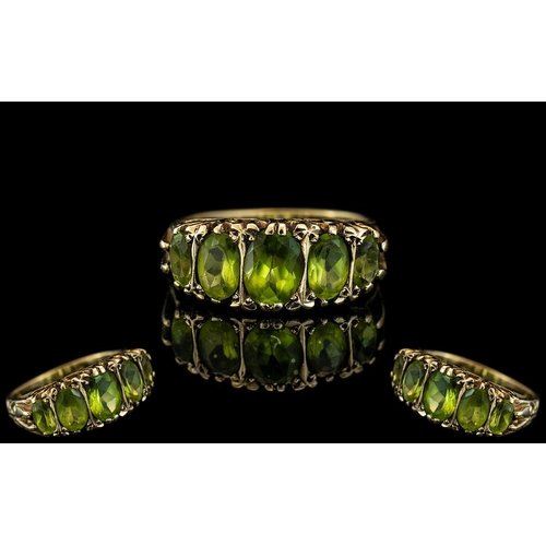 37A - Antique Period Attractive 9ct Gold 5 Stone Peridot Set Ring. Ornate Gallery Setting. The Faceted Per... 