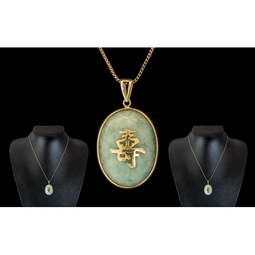 49 - A Vintage 9ct Gold - Jade Set Pendant of Oval Form, Set with Gold Chinese Character Figures to Centr... 