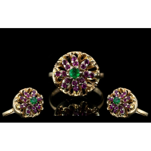 57A - Ladies Attractive 14ct Gold Ruby and Emerald Set Cluster Ring. The Central Emerald Surrounded by a C... 