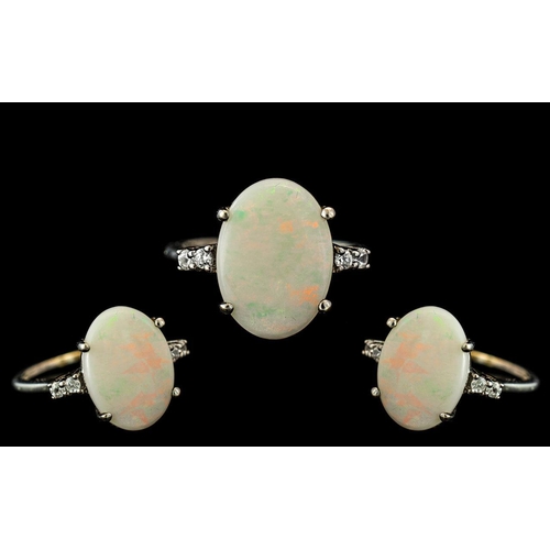 96 - Opal Ring Set In White Gold. Large Opal Approx 10 Ct, Set In White Gold. Fully Hallmarked for Gold. ... 
